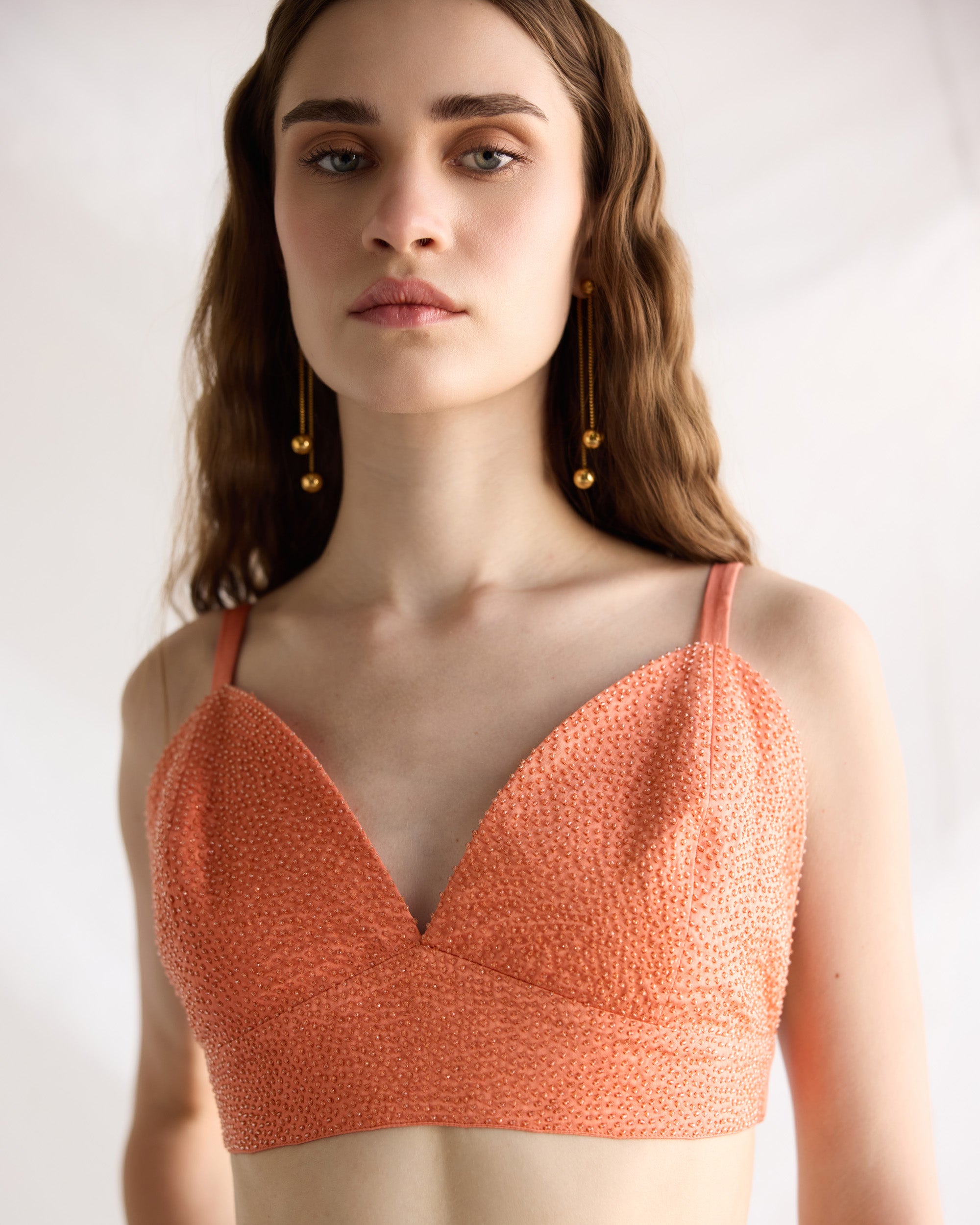 Orange hand beaded bralette