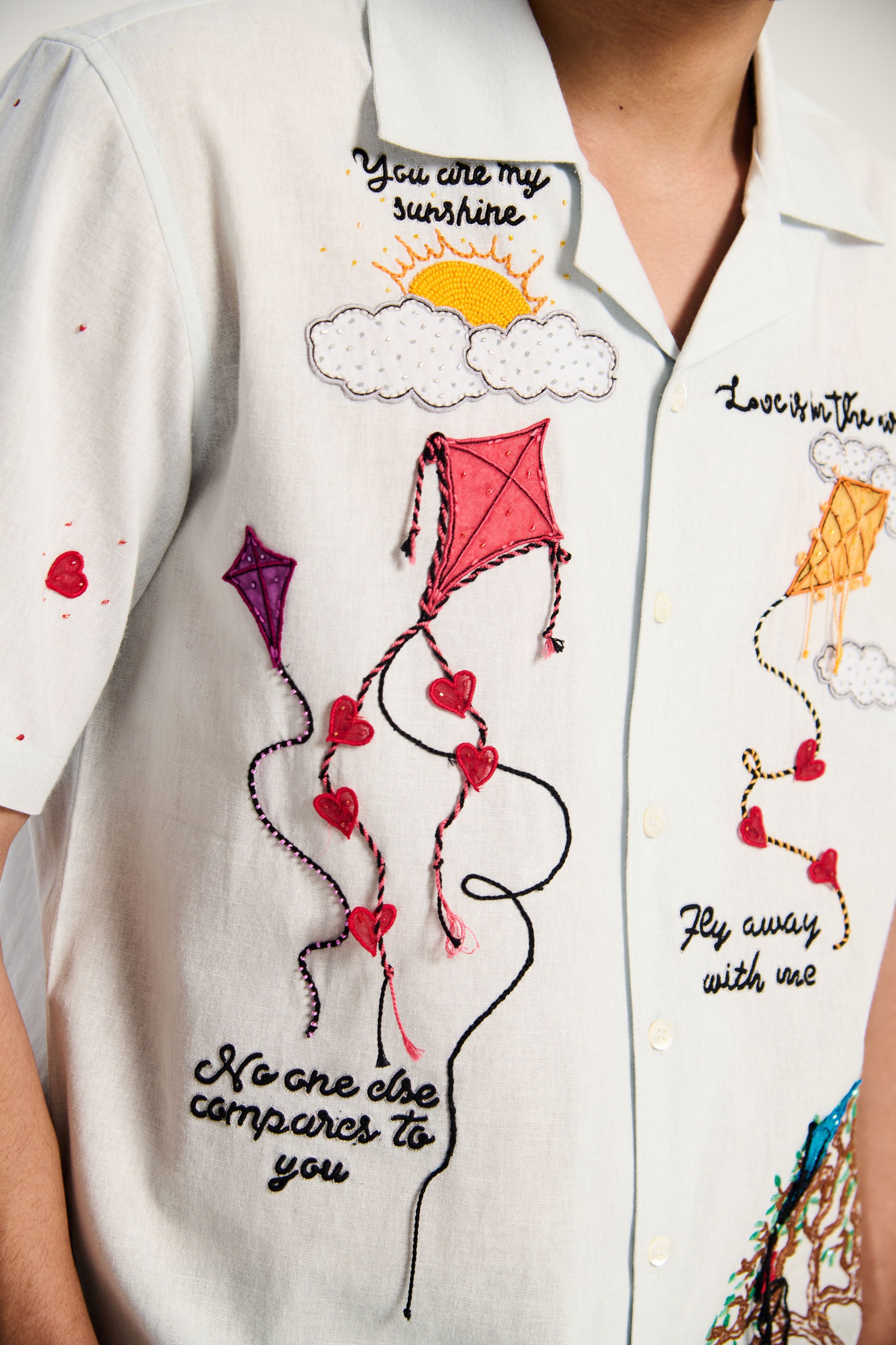 'Love is in the air" hand embroidered shirt