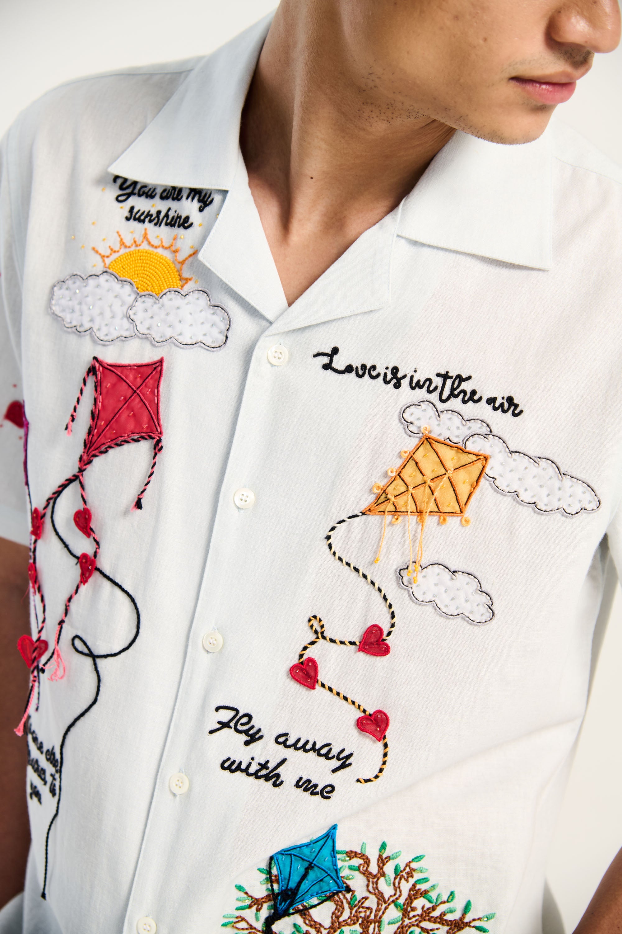 'Love is in the air" hand embroidered shirt