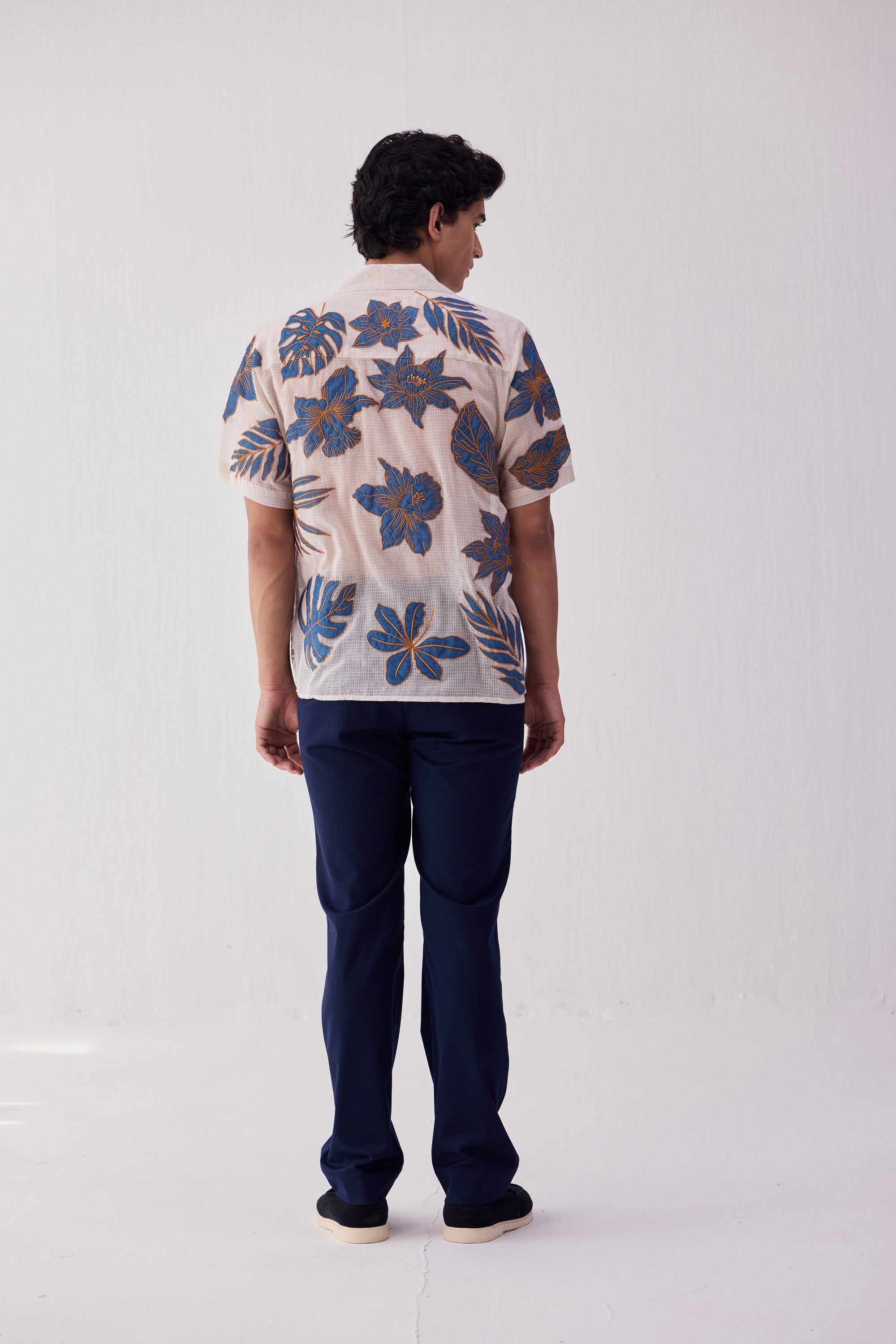 Blue floral appliqué shirt