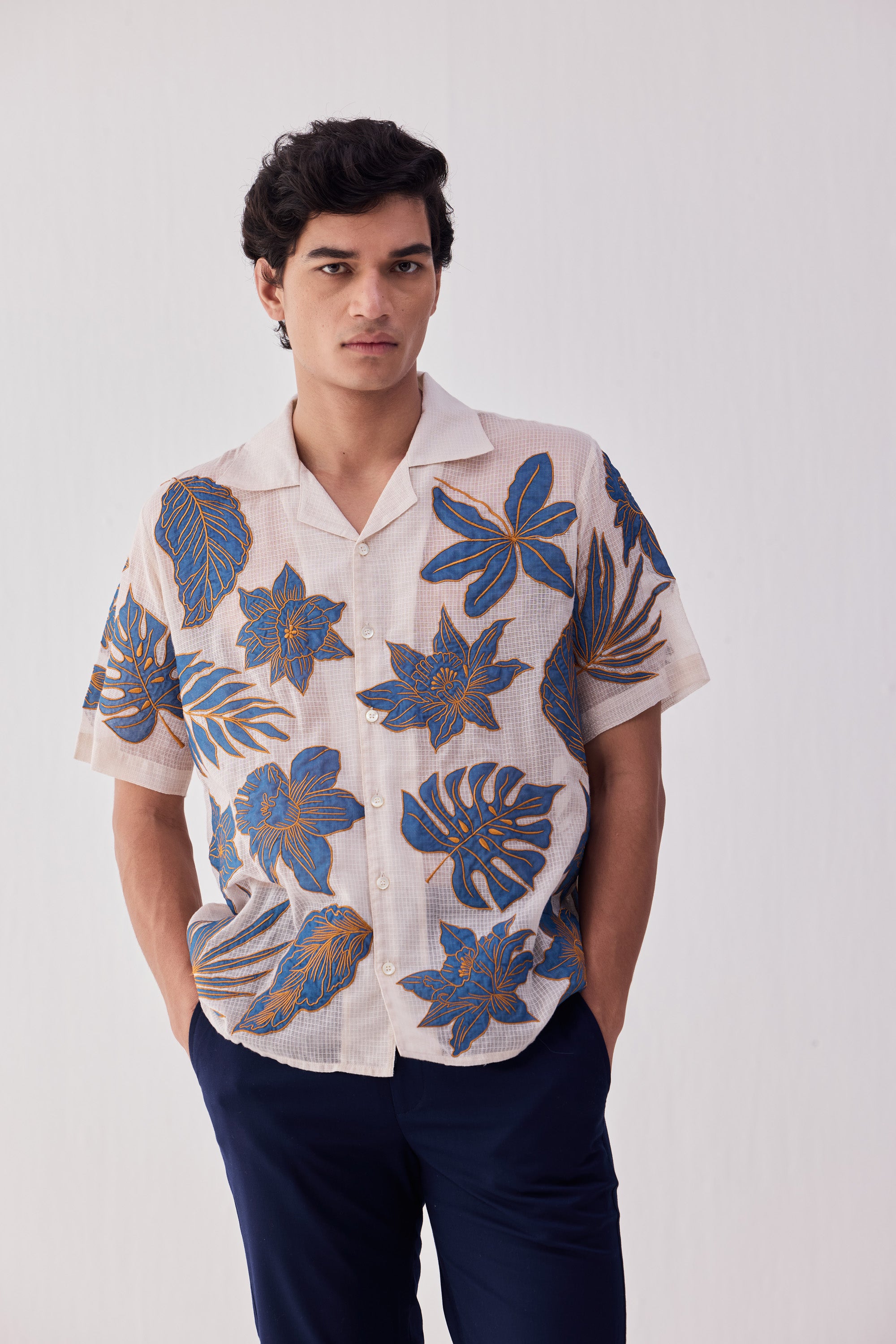 Blue floral appliqué shirt