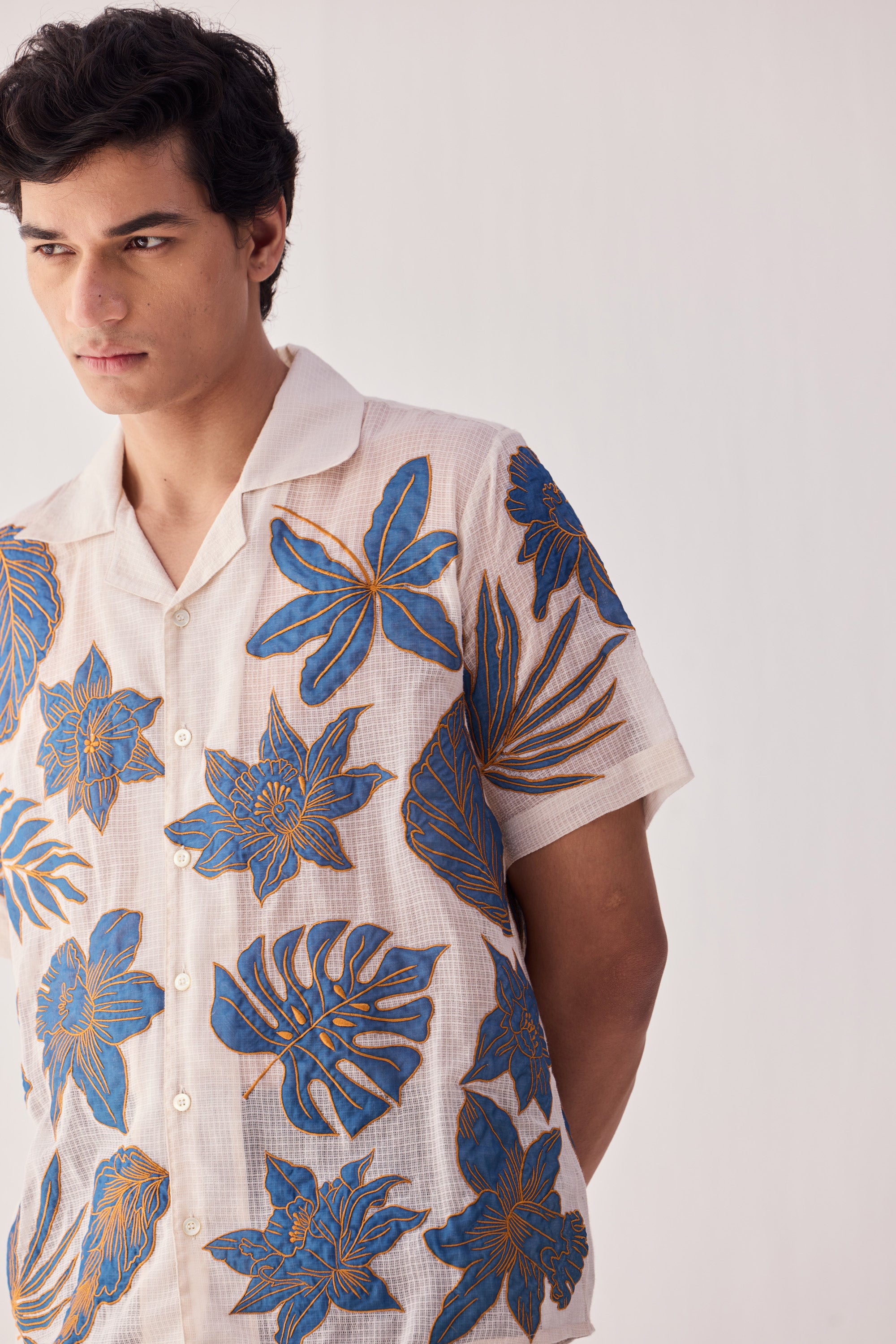 Blue floral appliqué shirt