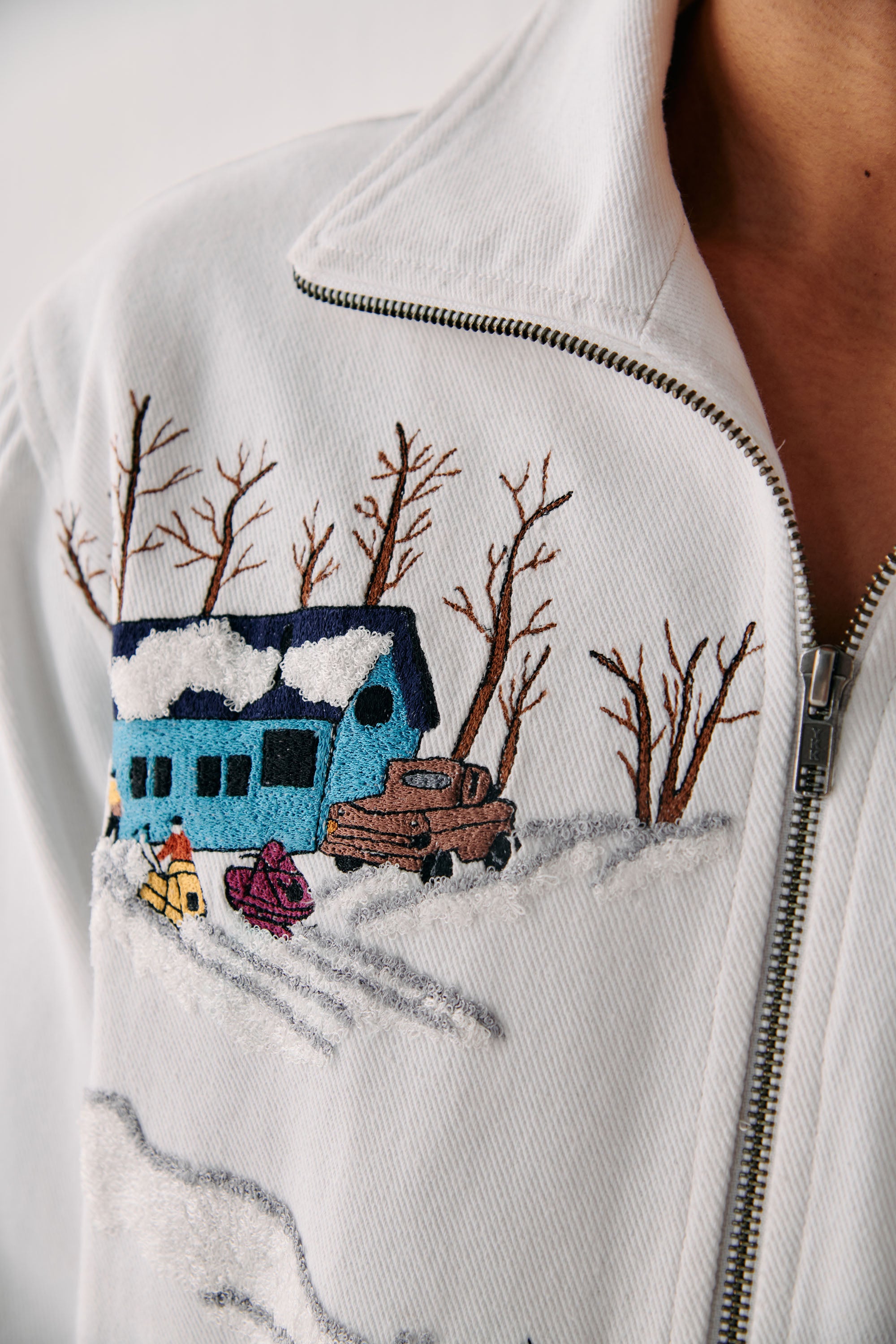 "Aprés ski" embroidered zip up jacket