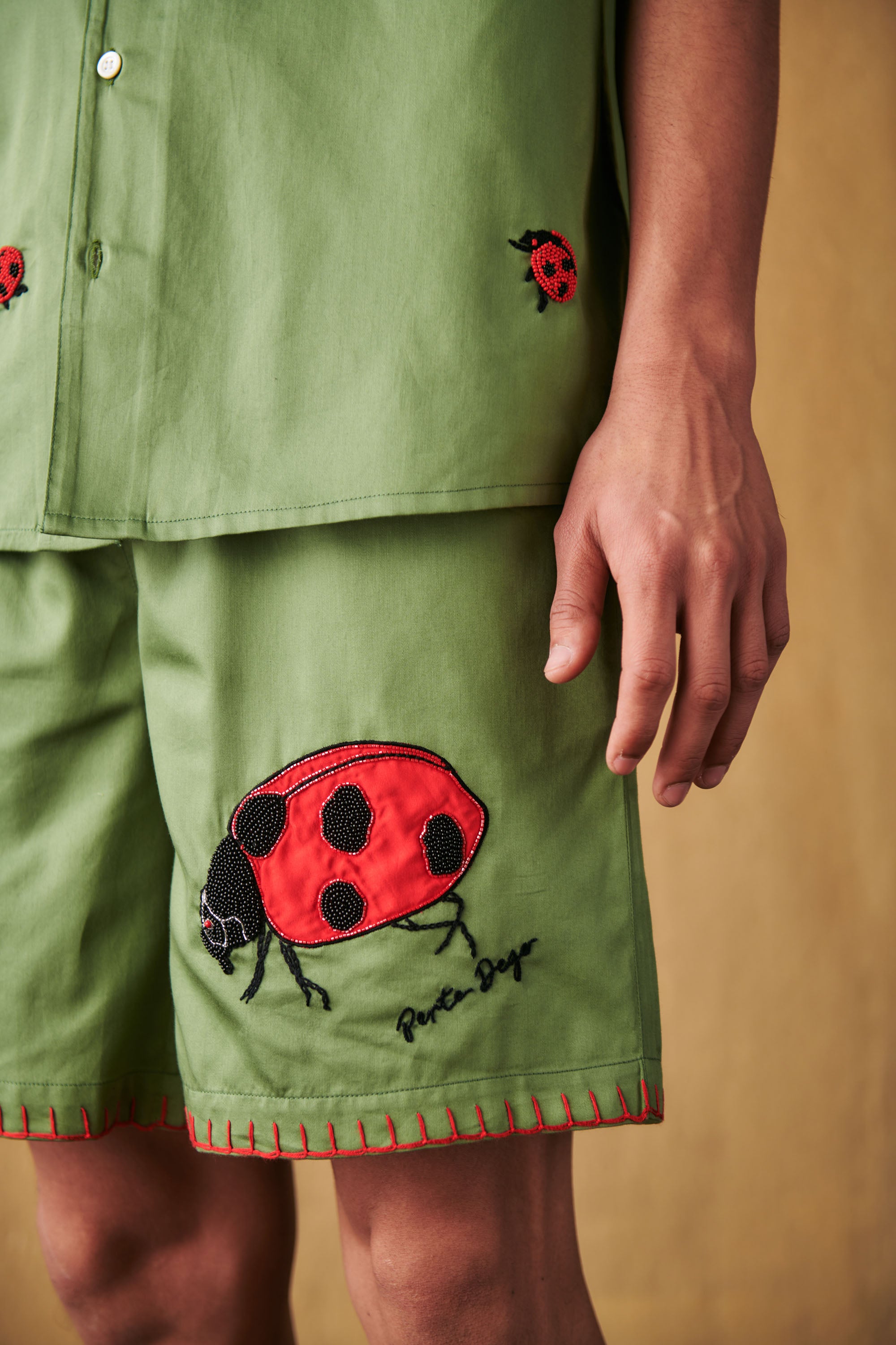 Ladybug appliqué shorts