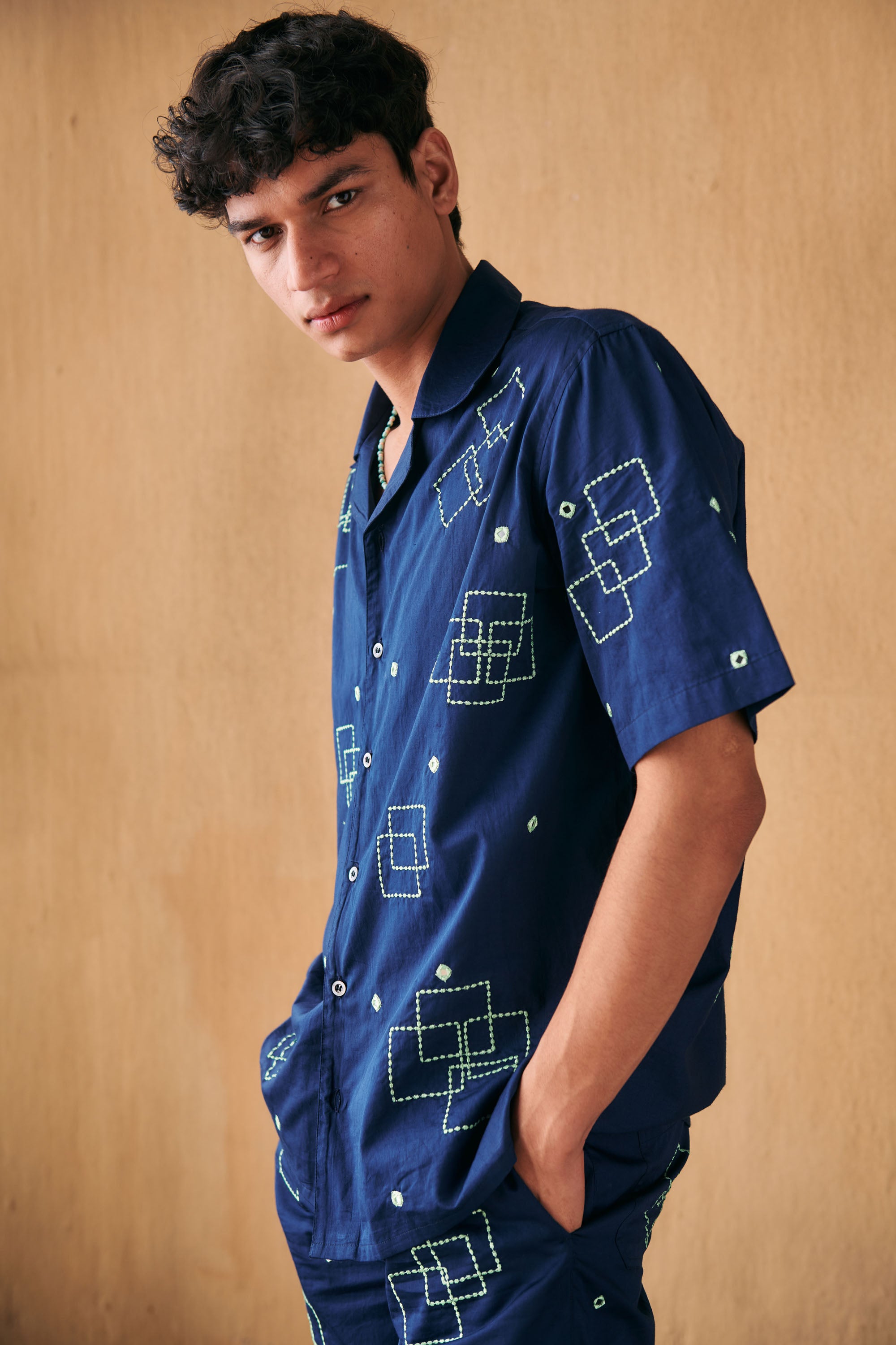 Geometrical mirror work hand embroidered shirt