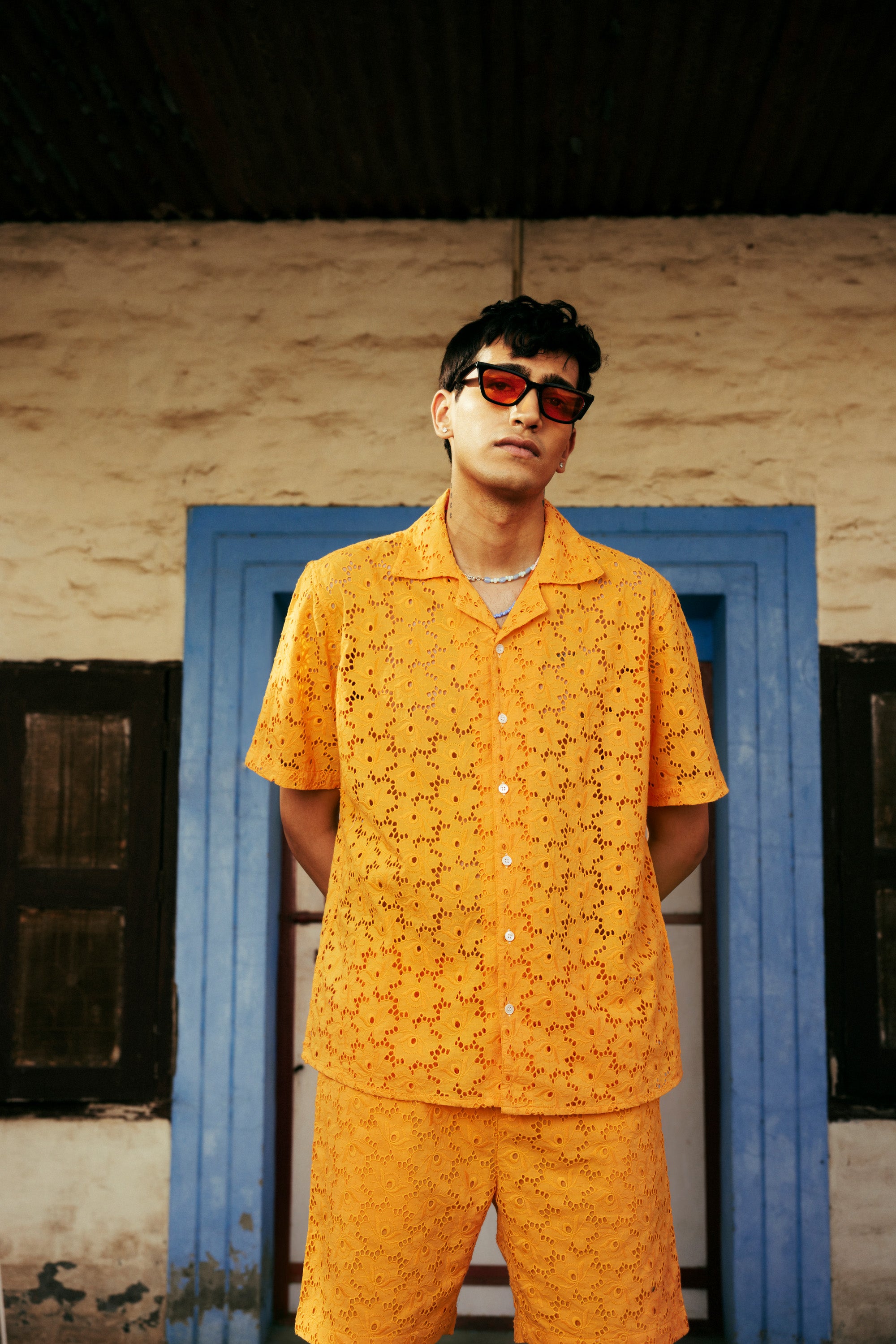 Orange floral embroidered shirt